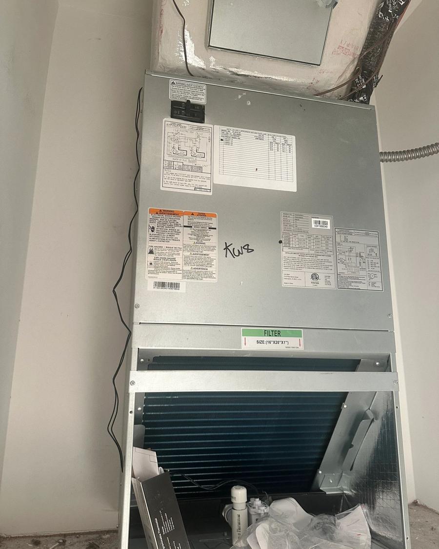 Air handler installed in a home utility closet