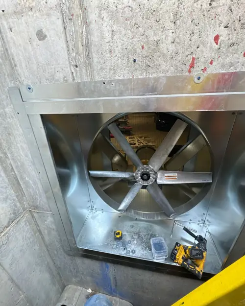 Large exhaust fan installed in a concrete shaft
