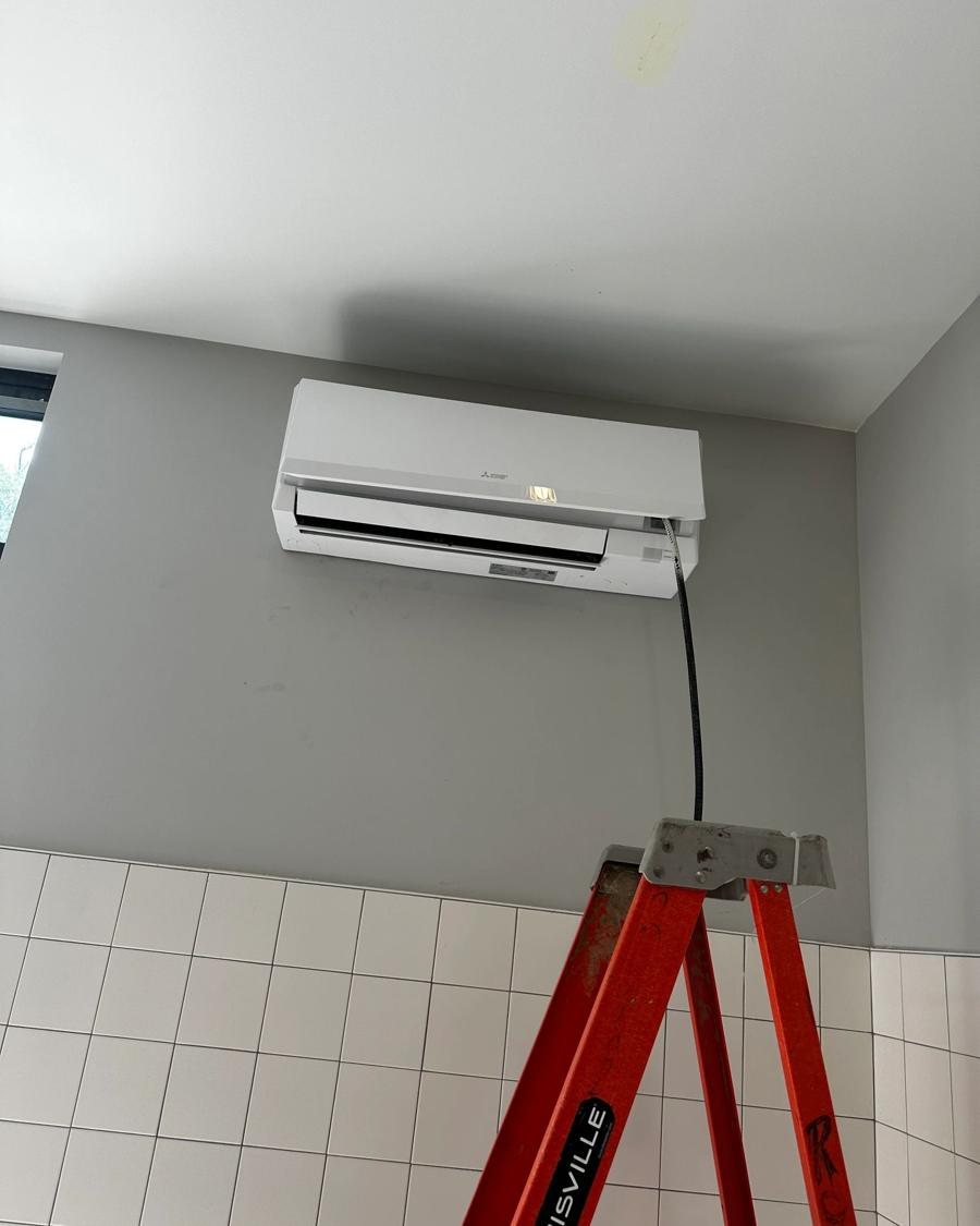 Mini-split head mounted in a finished apartment